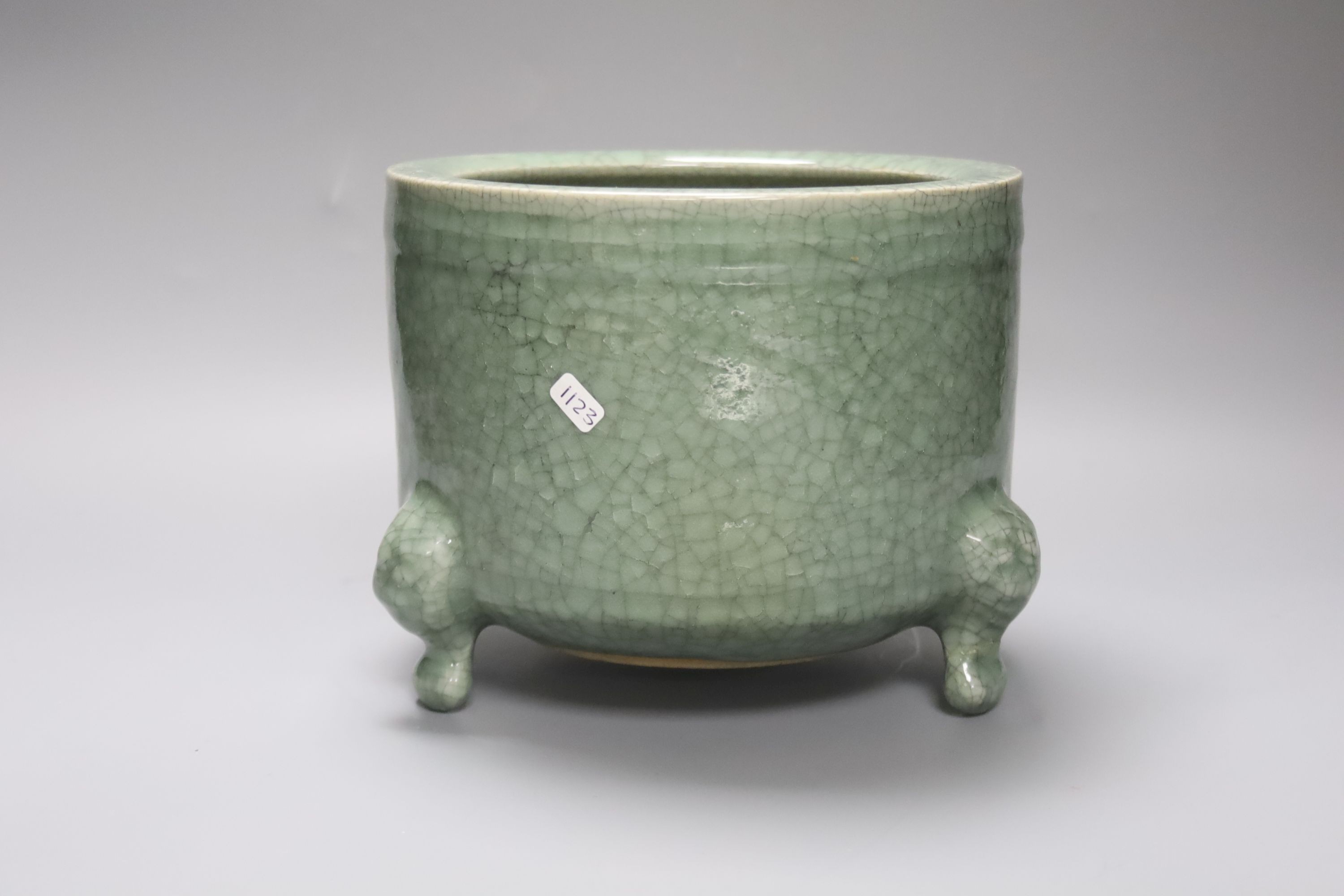 A large Chinese celadon crackleglaze tripod censer 15cm